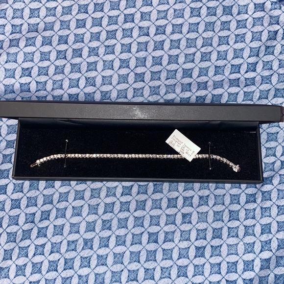 diamond tennis bracelet is set in elegant 14k white gold. - Picture 3 of 10